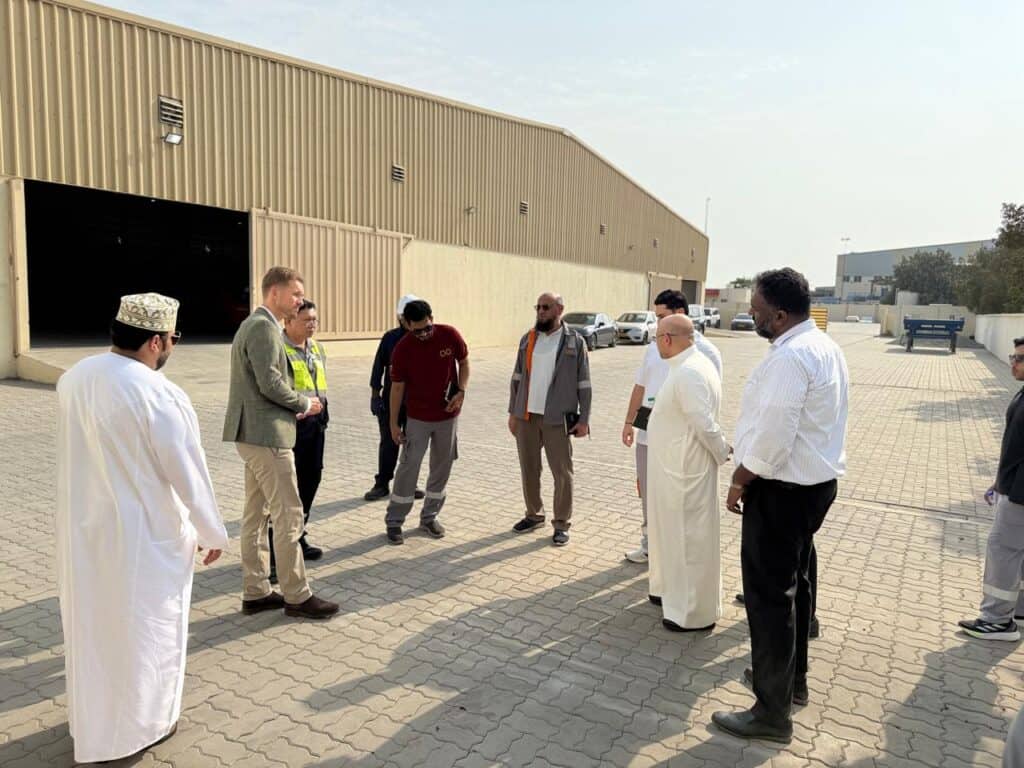 men standing and discussing